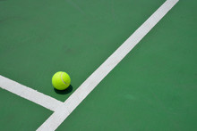 Tennis Ball On Tennis Court