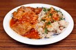 © adam88xx - Meat and grits topped with sauce on the table