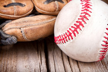 Baseball And Mitt On Wooden Background