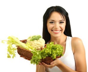 Wall Mural - Girl with vegetables isolated on white