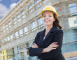 © Andy Dean - Portrait of Female Contractor Wearing Hard Hat at Construction S
