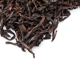 Wall Mural - Chinese black tea isolated on white background