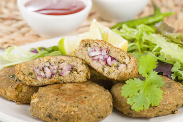 Wall Mural - Shami Kebab - Minced meat patties filled with red onion pickle