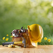 construction tool and helmet on green nature background