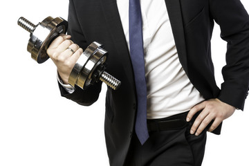 Businessman holding silver dumbbell