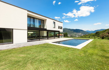 Modern villa with pool, view from the garden