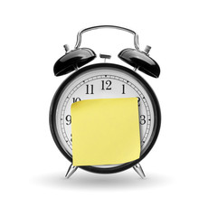 Wall Mural - Alarm clock with yellow sticky paper isolated on white backgroun