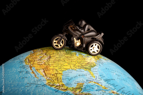 Nowoczesny obraz na płótnie Motorbike on globe