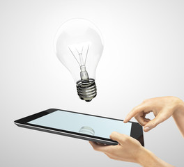 Wall Mural - tablet and lightbulb