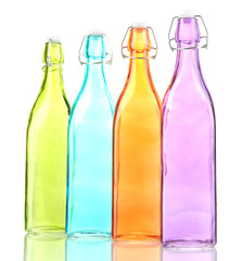 Poster - Empty color glass bottles, isolated on white