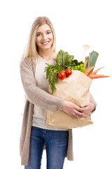 Poster - Beautiful woman carrying vegetables