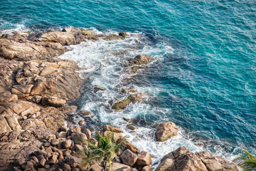 Wall Mural - Blue sea and rocks