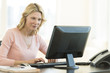 © tmc_photos - Businesswoman Using Computer In Office