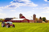 Fototapeta  - Traditional american red farm with tractor