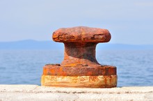 Old, Rusty Mooring Bollard On Port Of Podgora, Croatia
