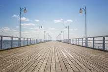Old Empty Wooden Pier Over The Sea Shore With Copy Space