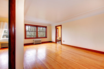 Empty room in an old apartment with beautiful hardwood.