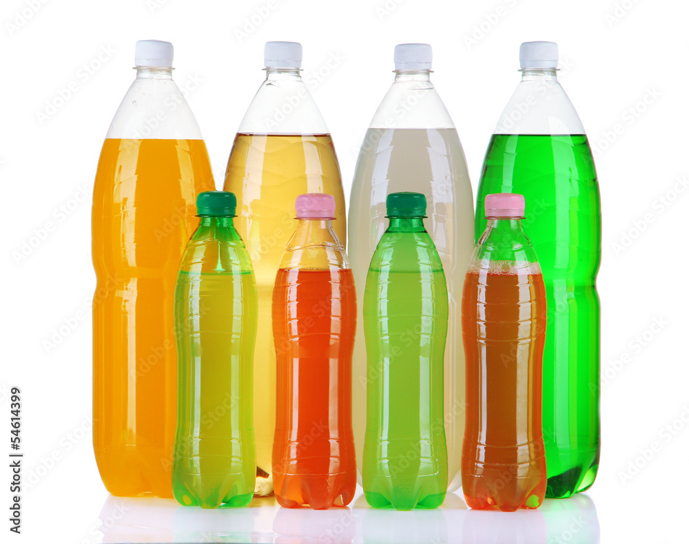 Assortment of bottles with tasty drinks, isolated on white
