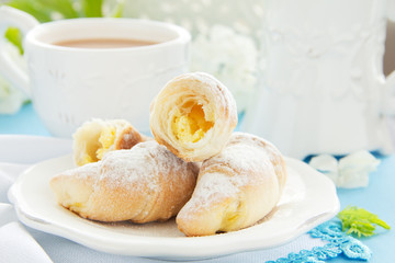 Homemade mini croissants with cream cheese.