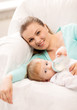 © Syda Productions - mother and adorable baby with feeding-bottle