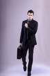© Mauro Rodrigues - young business man on grey