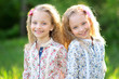 Portrait of two little girls twins