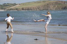 Children Having Fun In The Sea At Bigbury Devon