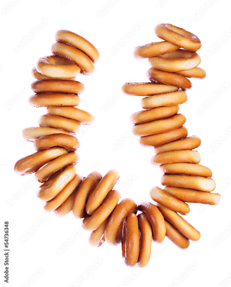 tasty bagels on rope, isolated on white