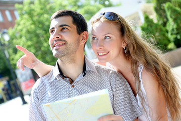 Young couple walking around the city