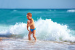 © Olesia Bilkei - happy boy kid having fun in sea water