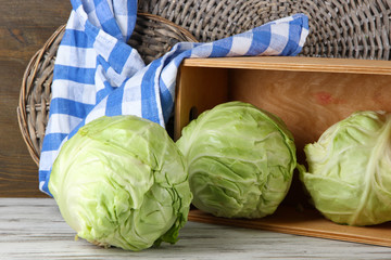 Wall Mural - Cabbage on table on wooden background