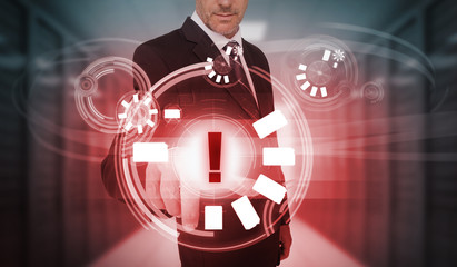 Poster - Businessman touching futuristic warning icon interface