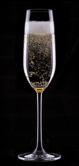 Wall Mural - glass of champagne isolated on black background