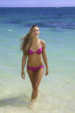 Fototapeta  - girl in bikini in the ocean