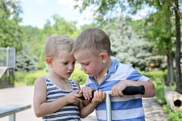 Two young boys arguing