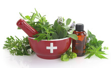 Mortar With Medicine Cross, Fresh Herbs And Essential Oil Bottle
