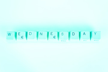 Fototapete - Wednesday word written with computer buttons