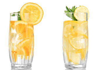 Poster - Glasses of fruit drinks with ice cubes isolated on white