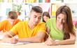 © Africa Studio - Group of young students sitting at the library