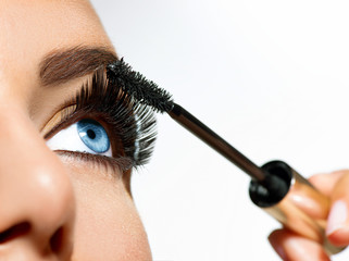 Poster - mascara applying. long lashes closeup