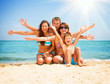 © Subbotina Anna - Happy Family Having Fun at the Beach. Vacation concept