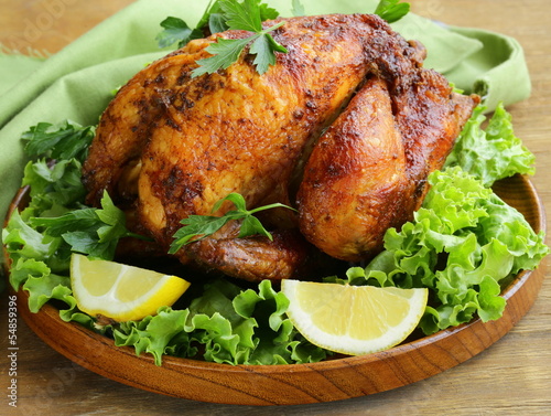 Naklejka dekoracyjna roasted chicken with herbs served with lemon