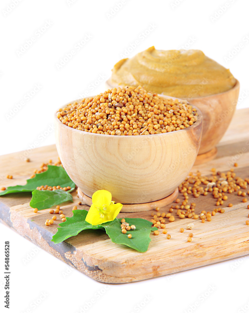 Mustard with seeds and mustard flower isolated on white