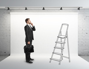 Sticker - businessman looking at ladder