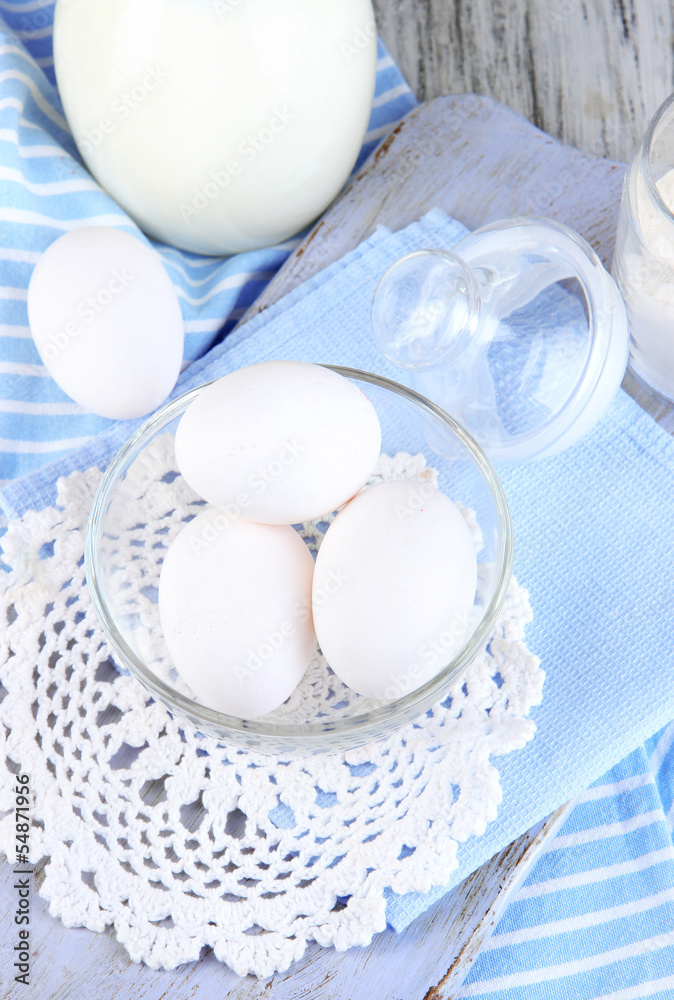 Ingredients for dough on wooden table close-up