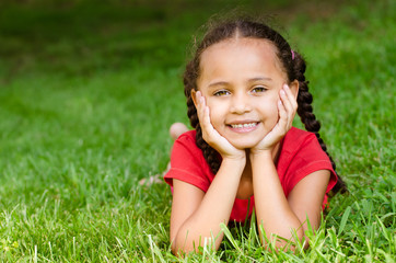 summer portrait of pretty mixed race girl outdoors