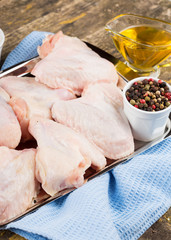 Wall Mural - Fresh chicken on wooden table