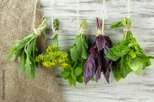 Fototapeta do kuchni Fresh herbs on wooden background