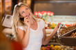 © Milles Studio - Grocery store - smiling woman shopping in supermarket