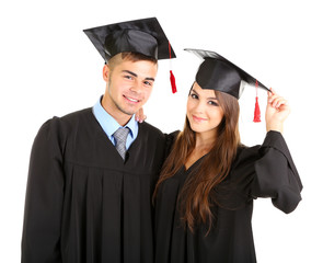 Wall Mural - Two happy graduating students isolated on white